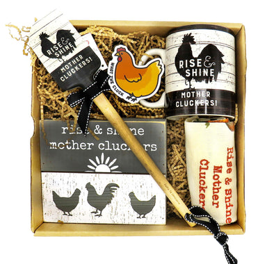 delightful box filled with a 'Rise and Shine Mother Clucker' sign, a ceramic mug, a quality dish towel, spatula, and sticker