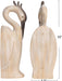 Wooden heron figurine with measurements on a white background