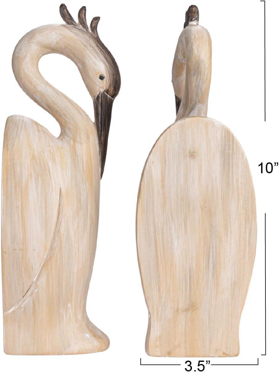 Wooden heron figurine with measurements on a white background