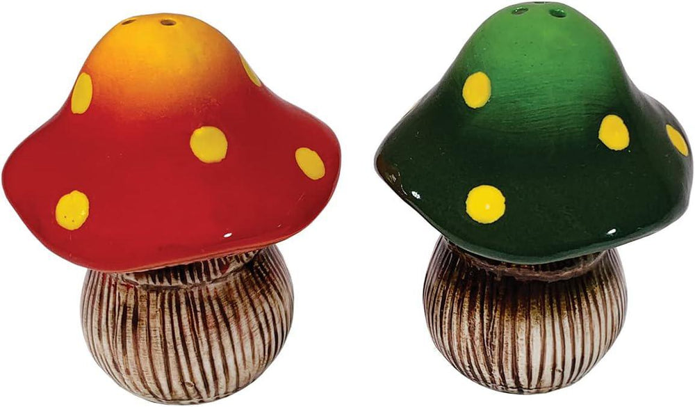 Two wooden mushroom figurines with colorful caps on a white background