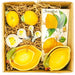 gift set that contains 4 ceramic measuring spoons, 4 cute lemon-shaped measuring cups made out of durable ceramic, salt & pepper shakers shaped like juicy lemons and lemon napkins 