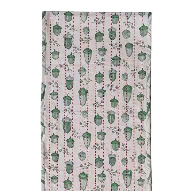 Fabric with acorn pattern on a white background