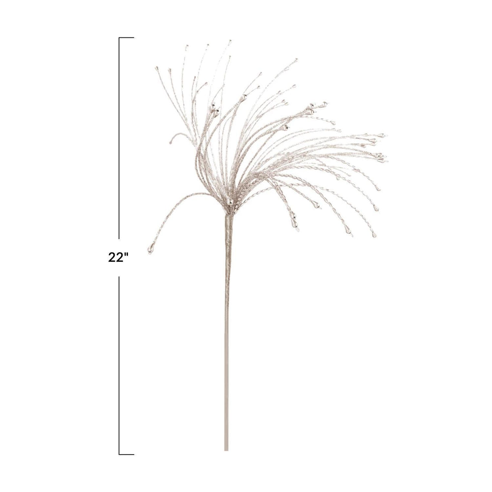 Decorative palm-like branch with measurements on a white background