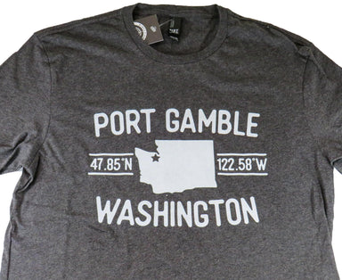  t-shirt. Featuring a map of Washington with the latitude and longitude coordinates of Port Gamble, in charcoal-colored