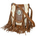 A western-style fringe shoulder bag made of brown leather and cream cowhide, decorated with silver conchos and a turquoise stone, shown on a white background.