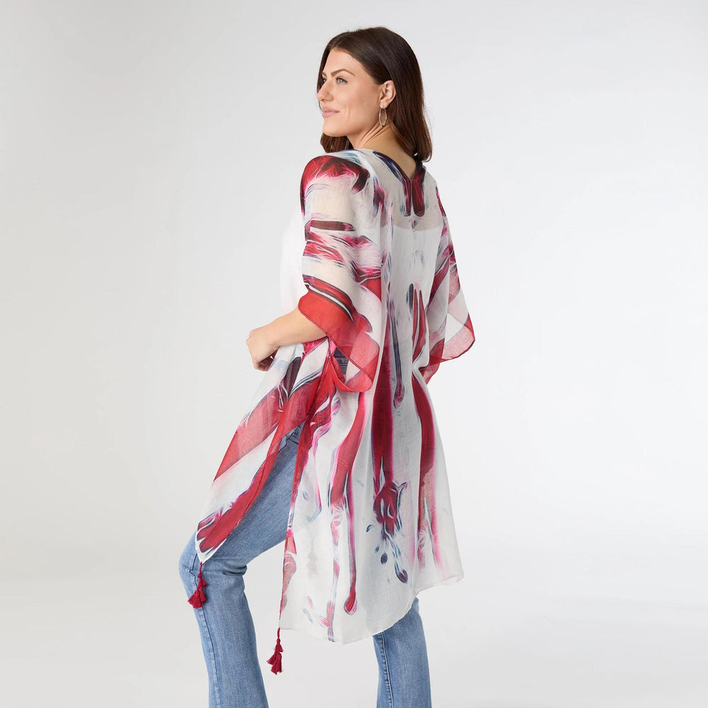 Woman wearing a red and white patterned kimono-style garment on a plain background