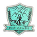 A shield-shaped sticker or patch with a turquoise and black nautical design featuring mountains, an anchor, a fish, laurel branches, and a banner reading 'Port Gamble' on a white background.