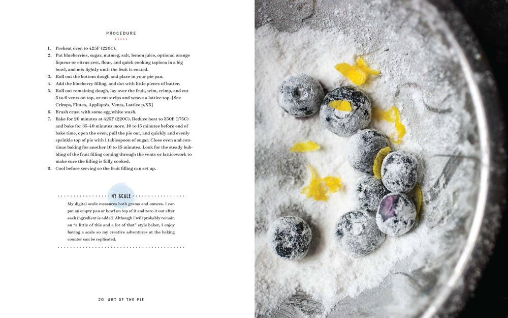 Dessert with blueberries and flowers on a plate next to a recipe text.
