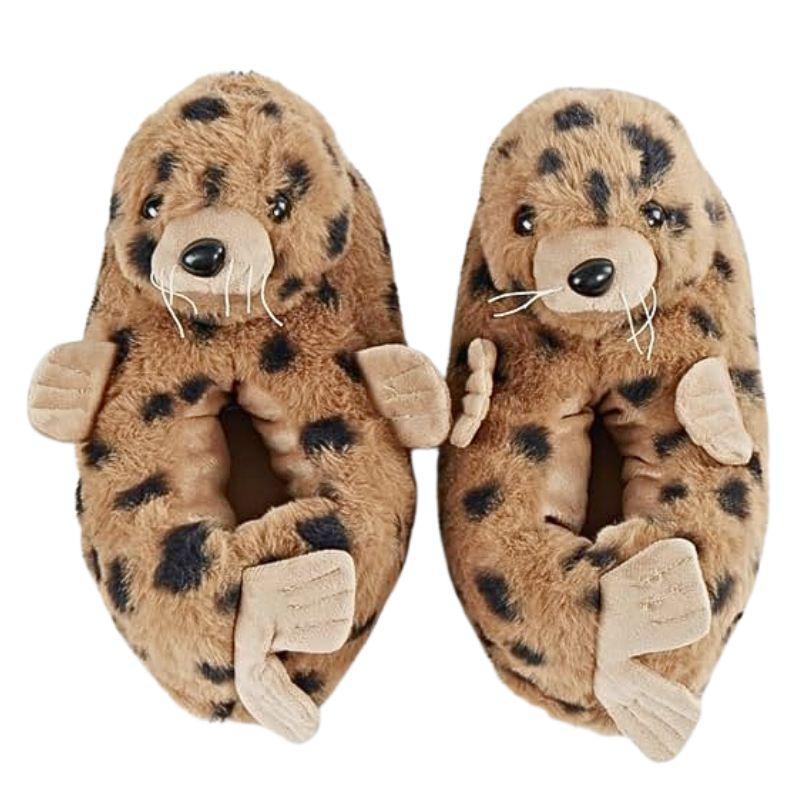 Pair of plush animal slippers with a seal design on a white background
