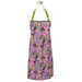Apron with hummingbird and floral pattern on a mannequin against a white background