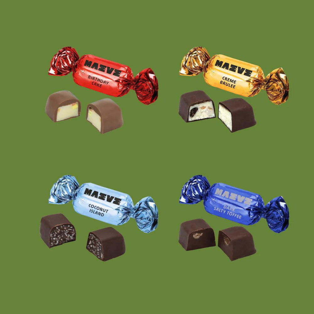 Four different flavors of Nasve chocolate candies on a green background