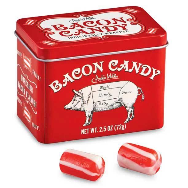 Red tin box of Bacon Candy with two pieces of candy on a white background