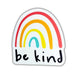 A die-cut sticker featuring a pastel rainbow with the words 'be kind' written in a black handwritten font on a white background.