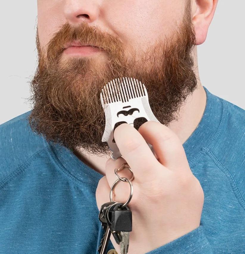 Person grooming a beard with a comb against a neutral background