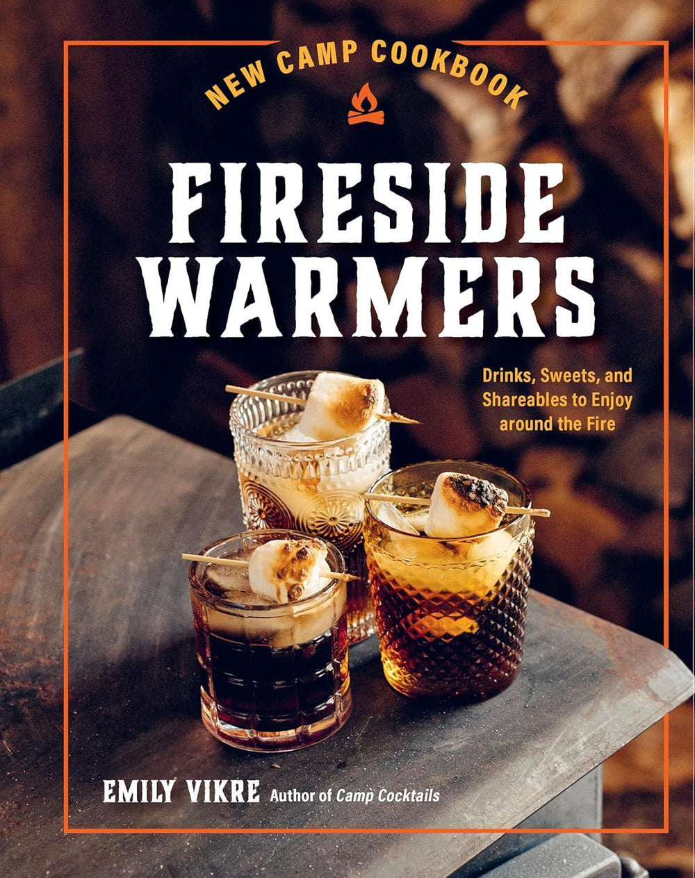 Book cover of 'Fireside Warmers' with cocktails on a wooden surface.