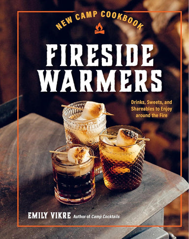 Book cover of 'Fireside Warmers' with cocktails on a wooden surface.