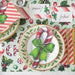 Christmas-themed table setting with candy cane design on plates and place cards.