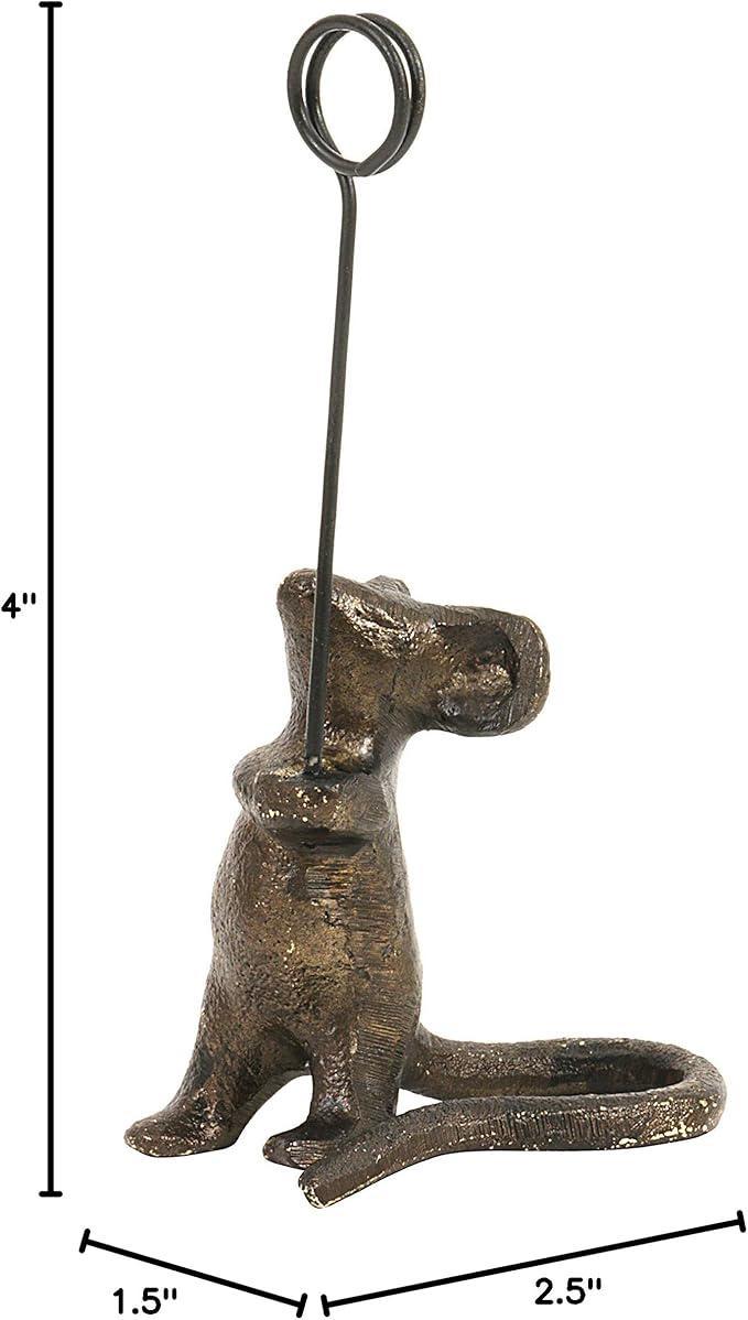 Bronze rat-shaped holder with a hook on a white background
