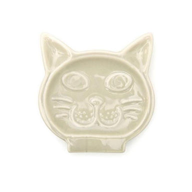 Ceramic cat-shaped dish on a white background