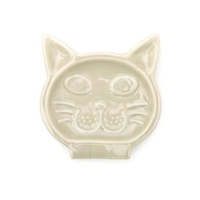 Ceramic cat-shaped dish on a white background