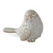 Ceramic bird figurine on a white background