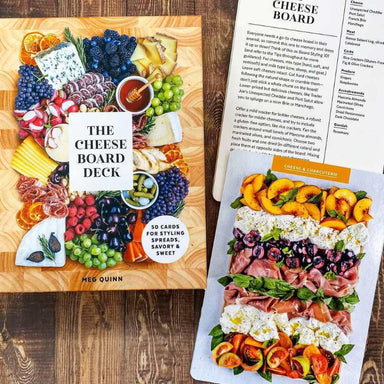 Cheese Board Deck with a sample cheese board layout on a wooden surface