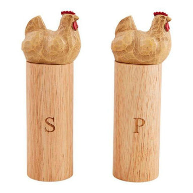 Wooden salt and pepper shakers with chicken designs on top, labeled 'S' and 'P'.