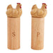 Wooden salt and pepper shakers with chicken designs on top, labeled 'S' and 'P'.