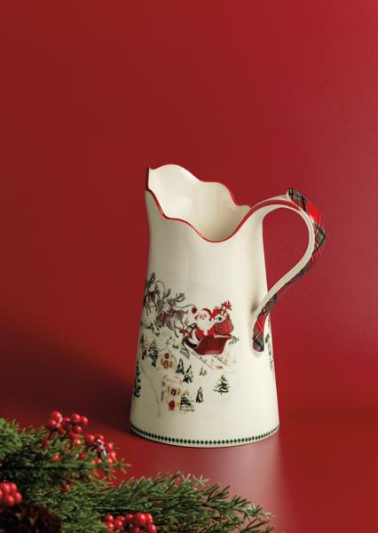 Decorative ceramic pitcher with Christmas design on a red background