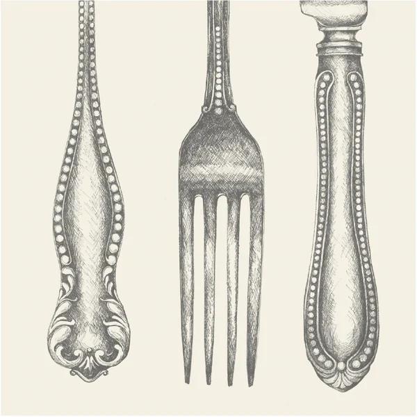 Decorative fork with ornate handles on a light background