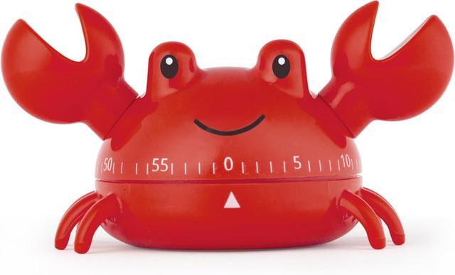 A red crab-shaped kitchen timer with a smiling face and measurement markings on the front, shown on a plain white background.