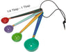 Set of colorful measuring spoons with a string on a white background