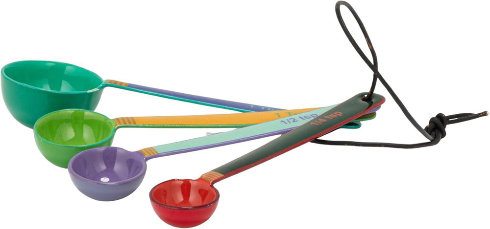 Set of colorful measuring spoons on a white background