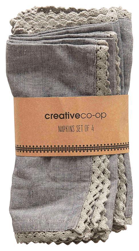Set of four gray napkins with lace edges and a 'creative co-op' label.