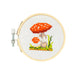 Cross-stitched mushroom design in a wooden hoop on a white background