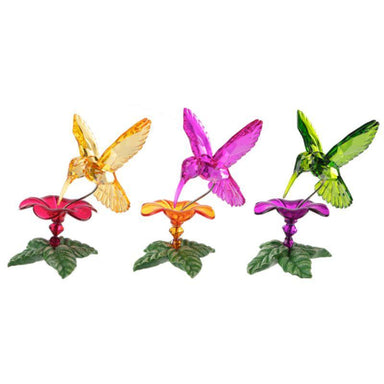 Add jewel-toned sparkle to your garden or tabletop! Collectible hummingbird figurines from Ganz Crystal Expressions, hand-polished, translucent acrylic. Sold individually and randomly chosen for a charming surprise!