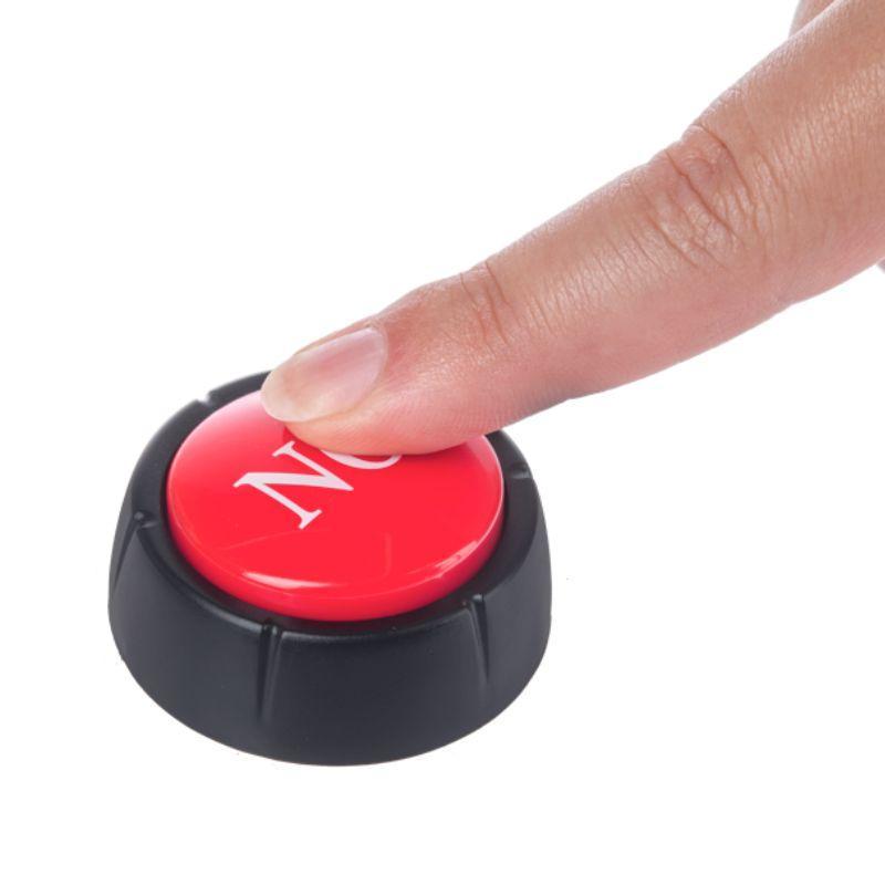 Red button with 'No' on it being pressed by a finger against a white background
