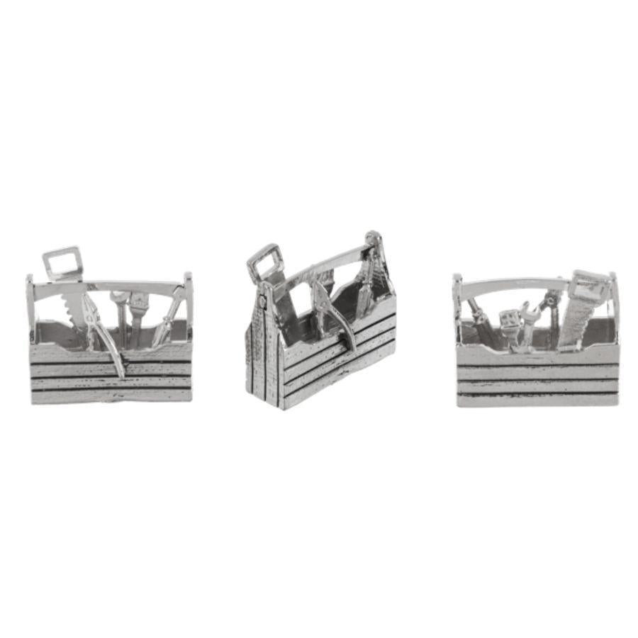 Silver tool box cufflinks on a white background