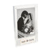 Decorative photo frame with 'mr. & mrs.' text, holding a black and white photo of a couple.