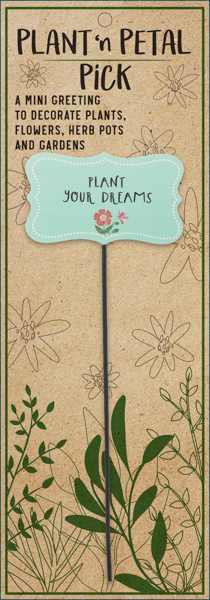 Decorative plant stake with 'Plant Your Dreams' message on a brown background with floral designs.