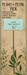 Decorative plant stake with 'Plant Your Dreams' message on a brown background with floral designs.