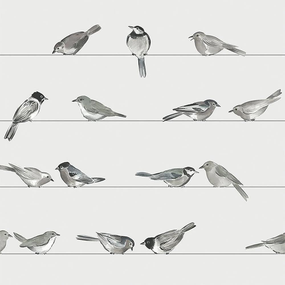 Pattern of black and white birds on a light gray background
