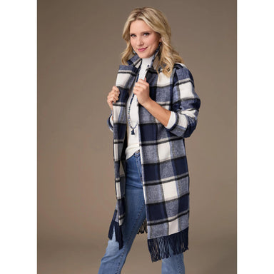 Woman wearing a blue and white plaid scarf with a brown background