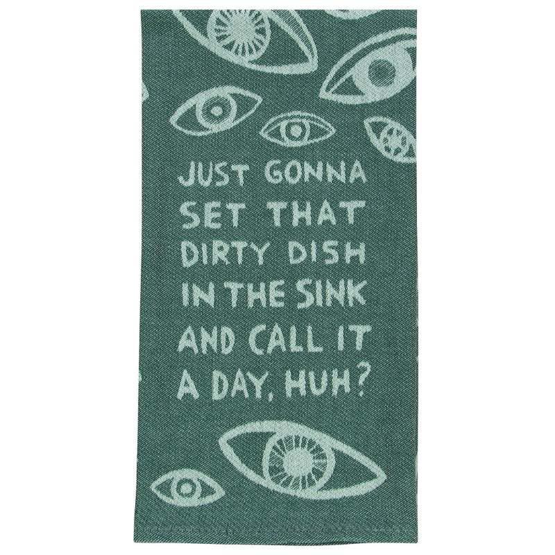 Teal towel with eye designs and humorous text on a white background