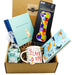 Gift set for Dog lover's that includes a portable dog bowl, "When you love a Dog" book, a bag of chocolate truffles, "I like dogs" ceramic mug, and a dog illustrated jurnal.  