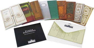 Collection of puzzle solutions books with various designs on a white background