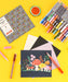Coloring supplies including markers, paper, and a completed artwork on a yellow background