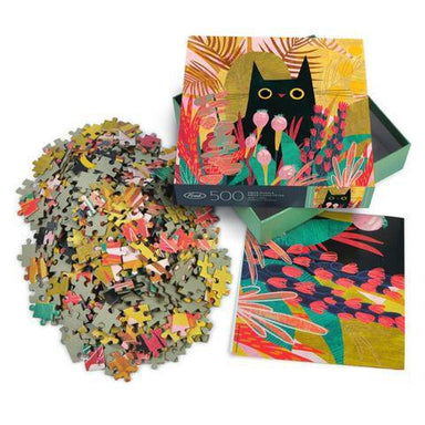 Jigsaw puzzle set with colorful packaging featuring a cat design.