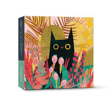 Jigsaw puzzle box with a black cat and floral design on a white background