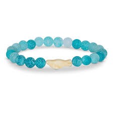 A beaded stretch bracelet featuring textured light blue and turquoise round beads, with a central cream-colored shell accent, shown on a plain white background.